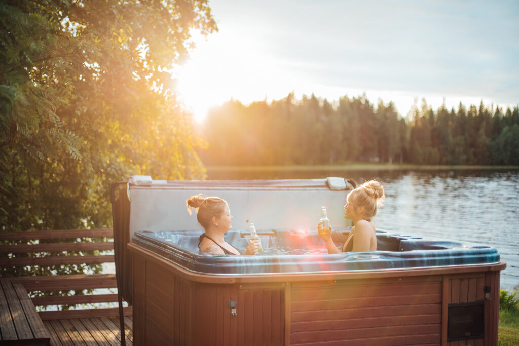 two young women in hot tub