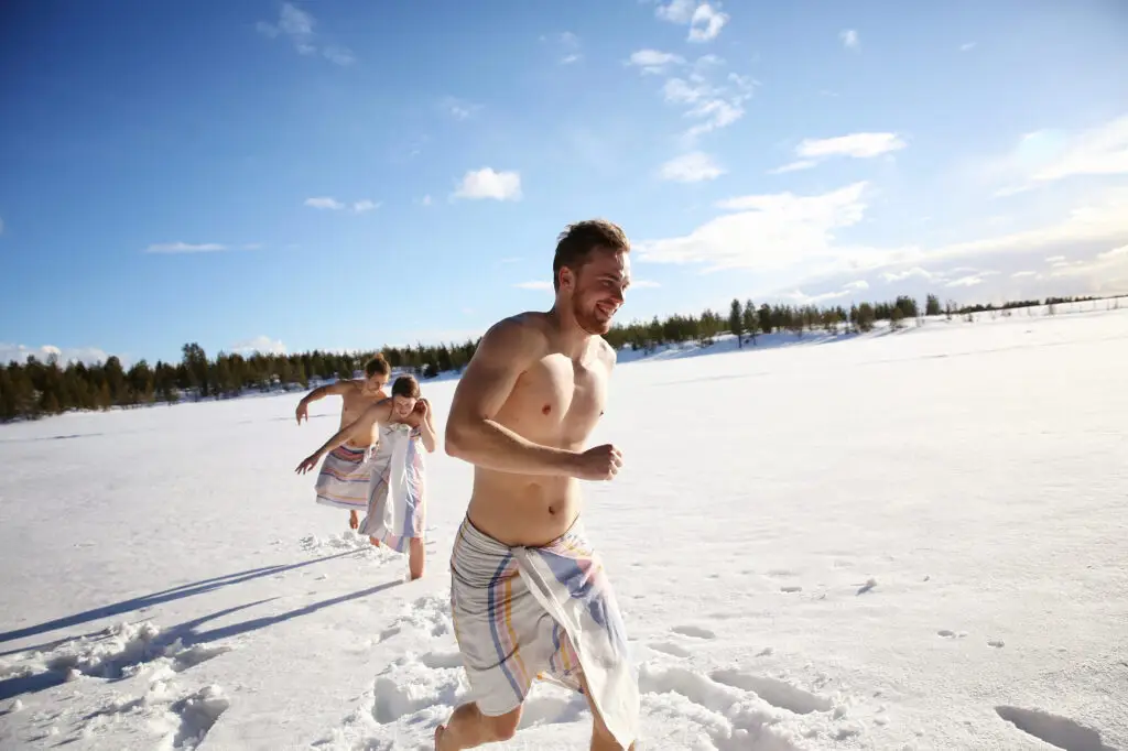 men running in snow