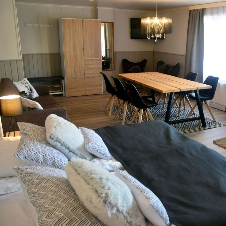 Revontuli Resort hotel room bed