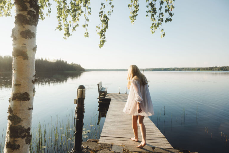 Girl on the pier during a summer day